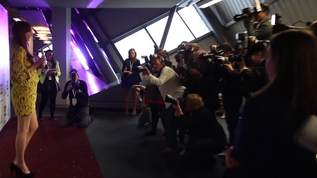 Video Reference: fashion, crowd, event, audience, performance art, fun, convention, flooring, Person