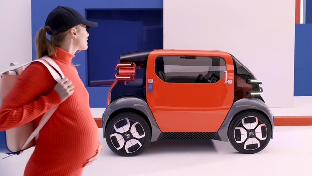 Video Reference: Land vehicle, Vehicle, Motor vehicle, Car, Model car, Automotive design, Electric car, Automotive wheel system, Compact car, Electric vehicle, Person