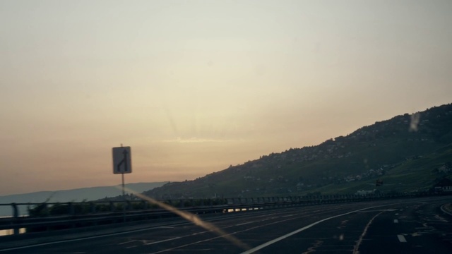 Video Reference: Sky, Atmospheric phenomenon, Horizon, Road, Freeway, Highway, Atmosphere, Morning, Daytime, Afterglow