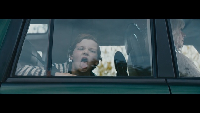Video Reference: Mode of transport, Head, Vehicle door, Automotive exterior, Photography, Auto part, Automotive window part, Driving, Movie, Vehicle, Photo, Man, Looking, Woman, Sitting, Bus, Holding, Phone, Screen, Orange, Computer, Television, White, Standing, Mirror, Playing, Blue, Human face, Person, Screenshot, Display