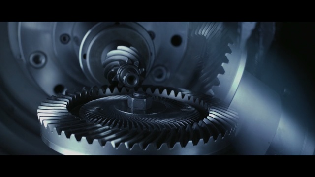 Video Reference: close up, hardware accessory, computer wallpaper, gear, wheel, macro photography, product, darkness, Person