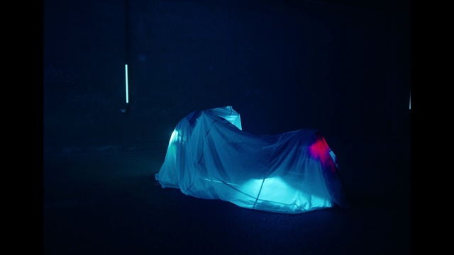 Video Reference: Blue, Light, Lighting, Darkness, Technology, Electric blue, Photography, Performance, Dark, Indoor, Lit, Room, Sitting, Computer, Monitor, Laptop, Television, Water, Screen, Front, Looking, Bed, Night, Large, Black, Desk, Sun, Table, Man, Bedroom, Air, Flying, Red, Animal, Standing, White, Snow, Remote, Tent, Cobalt blue, Art, Aqua