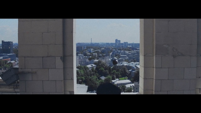 Video Reference: sky, urban area, landmark, skyscraper, city, architecture, wall, daytime, metropolitan area, building