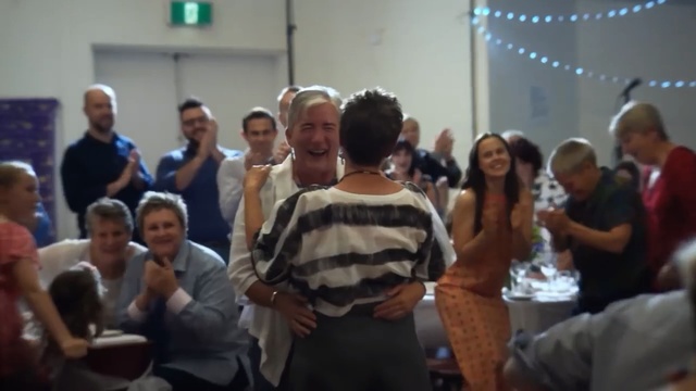 Video Reference: event, community, ceremony, crowd, audience, party, fun, banquet, Person