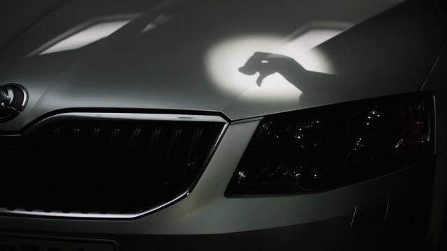 Video Reference: car, motor vehicle, black, automotive lighting, vehicle, automotive design, headlamp, light, mode of transport, grille
