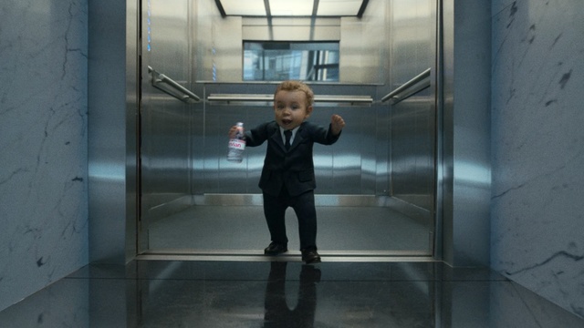 Video Reference: Standing, Snapshot, Elevator, Glass, Architecture, Door, Daylighting, Screenshot, Reflection, Metal, Person, Building, Cabinet, Indoor, Front, Refrigerator, Looking, Man, Young, Floor, Large, Display, Holding, Gate, Train, Kitchen, Bus, Clothing, Toddler, Boy, Human face, Child, Footwear