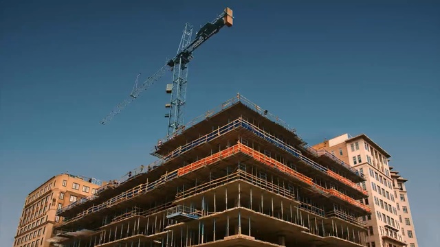 Video Reference: Sky, Architecture, Landmark, Construction, Urban area, Building, Crane, City, Condominium, Real estate