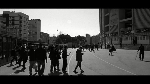 Video Reference: urban area, white, people, black, photograph, black and white, street, sky, city, infrastructure, Person