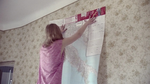 Video Reference: pink, room, purple, textile, wall, floor, interior design, flooring, curtain, design, Person