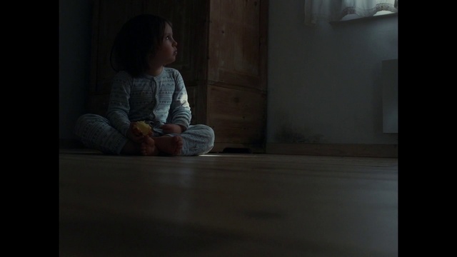 Video Reference: Child, Sitting, Floor, Standing, Darkness, Human, Eye, Flooring, Room, Window