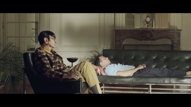 Video Reference: home, couch, person, adult, room, sitting