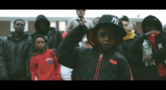 Video Reference: people, red, black, social group, crowd, youth, community, fun, team, event, Person