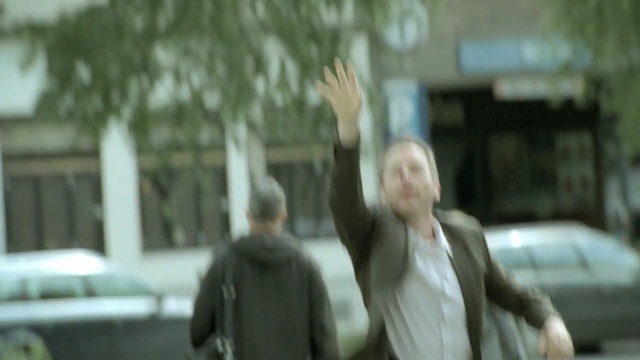 Video Reference: snapshot, car, vehicle, street, girl, tree, road, Person