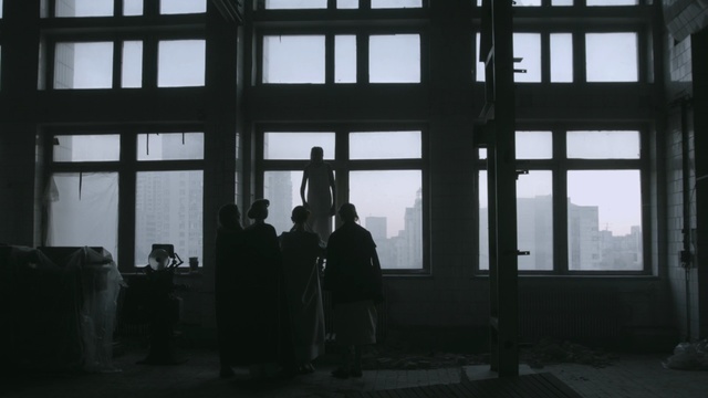 Video Reference: window, darkness, black and white, building, facade, Person