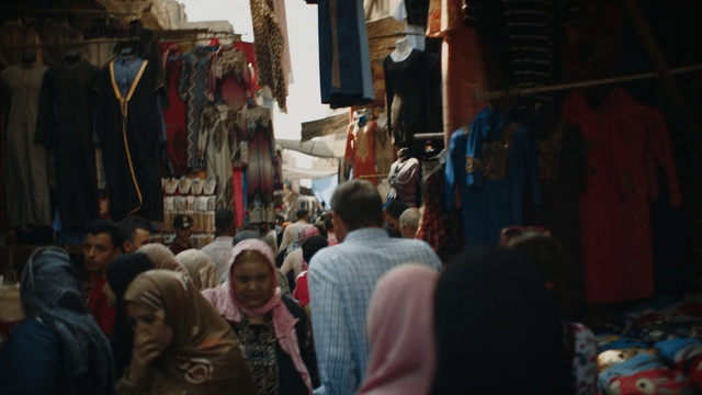 Video Reference: Bazaar, Market, People, Public space, Human settlement, Marketplace, City, Town, Street, Selling, Person