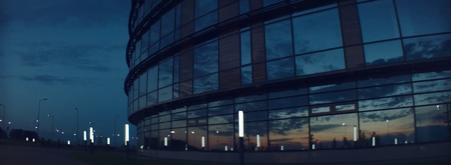 Video Reference: Architecture, Metropolitan area, Commercial building, Sky, Corporate headquarters, Building, Landmark, Headquarters, Facade, Urban area