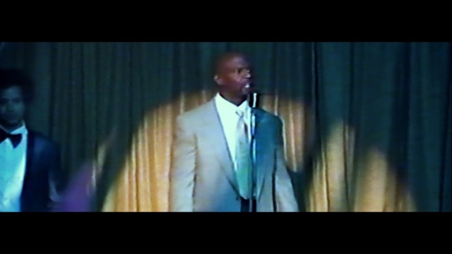 Video Reference: Formal wear, Suit, Gentleman, Speech, Male, Performance, Public speaking, Event, Stage, Orator