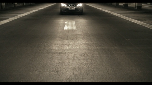 Video Reference: asphalt, lane, black, photograph, road, infrastructure, light, floor, mode of transport, atmosphere, Person