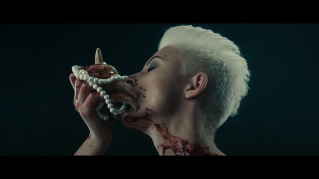 Video Reference: mouth, jaw, human, screenshot, organism, darkness, facial hair, performance, scene, computer wallpaper