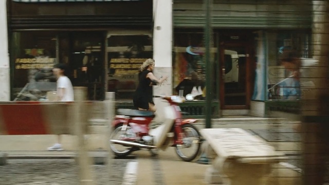 Video Reference: land vehicle, vehicle, street, bicycle, snapshot, road, recreation, window, sports equipment