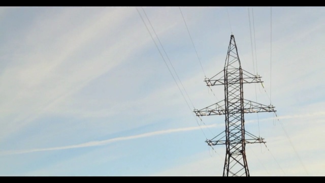 Video Reference: sky, electricity, overhead power line, transmission tower, electrical supply, energy, cloud, public utility, tower, line