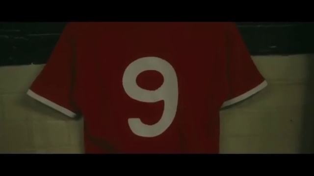 Video Reference: T-shirt, Sportswear, Jersey, Clothing, Red, Number, Font, Text, Sleeve, Top