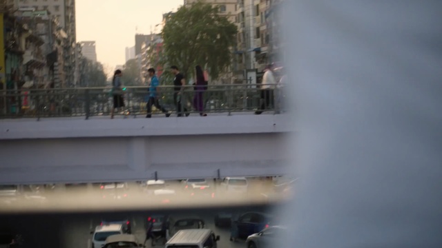 Video Reference: urban area, water, vehicle, city, building, tree, window, recreation, street, road