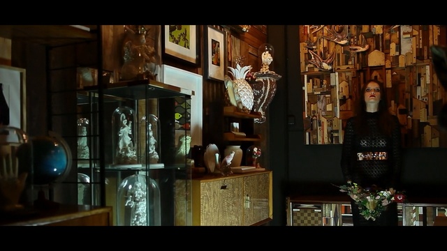 Video Reference: darkness, window, night, bar, glass, bottle, distilled beverage, Person