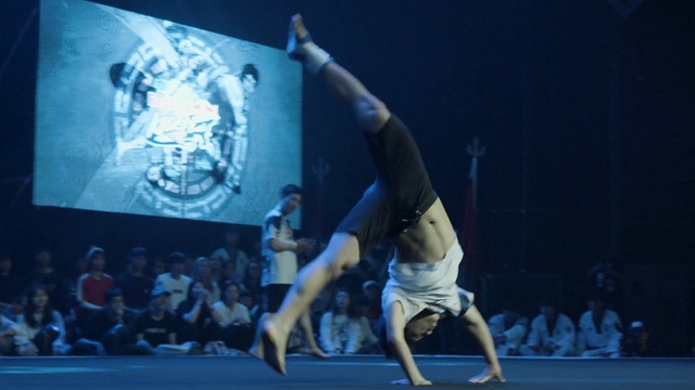 Video Reference: blue, performance, performing arts, dancer, entertainment, sport venue, stage, dance, performance art, event