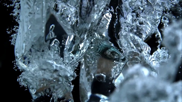 Video Reference: Water, Freezing, Ice, Crystal, Close-up, Icicle, Macro photography, Winter, Photography, Frost, Person, Cake, Table, Sitting, Covered, Glass, Large, Chocolate, Close, Flower, Clear, Birthday, Vase, White, Droplet, Fluid, Cold, Liquid, Frozen