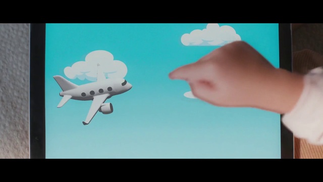 Video Reference: Cartoon, Finger, Hand, Azure, Illustration, Turquoise, Cloud, Design, Organism, Gesture, Photo, Woman, Screen, Looking, Man, Monitor, Television, Table, Large, Blue, Girl, Video, White, Room, Colorful, Holding, Playing, Display, Remote, Shirt, Screenshot, Text