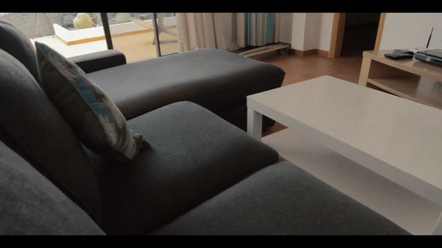 Video Reference: furniture, table, floor, chair, couch, flooring, angle, interior design, product, Person