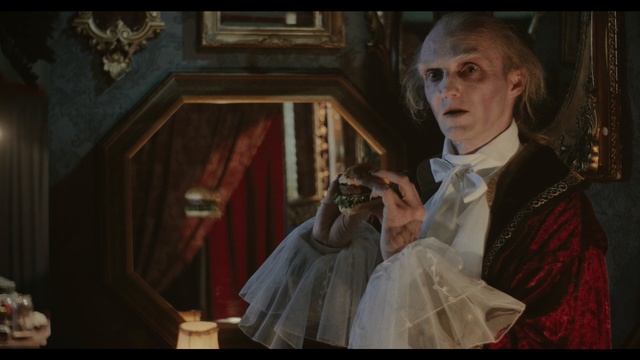 Video Reference: Portrait, Screenshot, Art, Gentleman, Painting, Scene, Person, Necktie, Woman, Wearing, Dress, Holding, Standing, Lady, Man, Looking, Young, Front, Hand, Suit, Shirt, Dressed, Smiling, Girl, White, Neck, Wedding, Red, Human face, Clothing, Wedding dress