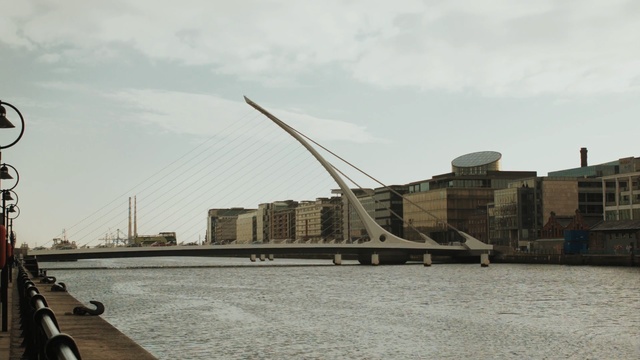 Video Reference: waterway, sky, water, bridge, building, fixed link