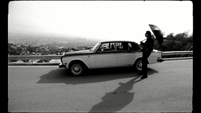 Video Reference: car, motor vehicle, black, black and white, vehicle, automotive design, monochrome photography, photography, snapshot, classic