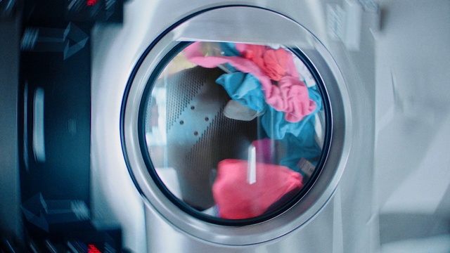 Video Reference: Pink, Washing machine, Laundry, Clothes dryer, Major appliance, Circle, Washing, Reflection, Colorfulness