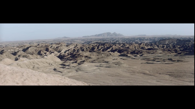 Video Reference: Mountainous landforms, Sky, Badlands, Mountain, Wilderness, Wadi, Geology, Cloud, Photography, Rock