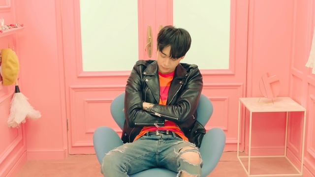 Video Reference: pink, room, sitting, furniture, shoulder, girl, textile, outerwear, product