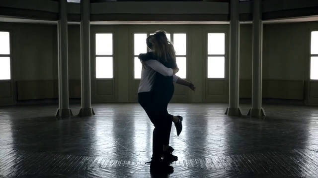 Video Reference: Choreography, Dance, Performing arts, Standing, Dancer, Footwear, Event, Leg, Photography, Modern dance, Floor, Building, Window, Water, Riding, Young, Woman, Rain, Open, Table, Luggage, Suitcase, Umbrella, Man, Room, City, Clothing, Person