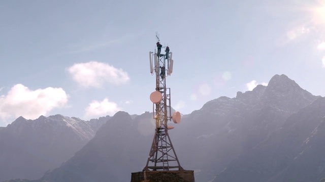 Video Reference: Mountain range, Mountain, Cellular network, Sky, Technology, Hill station, Summit, Tower, Vehicle, Transmitter station