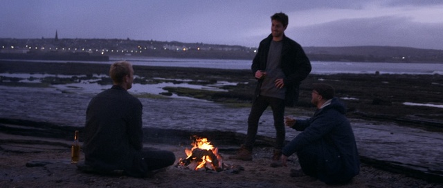 Video Reference: body of water, sea, campfire, water, evening, shore, geological phenomenon, beach, sky, fun, Person