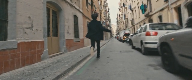 Video Reference: Street, Pedestrian, Town, Lane, Mode of transport, Sidewalk, Street fashion, Neighbourhood, Snapshot, Fashion, Person