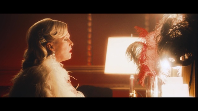Video Reference: groom, feather boa, scarf, garment, clothing, person, sexy, adult, portrait