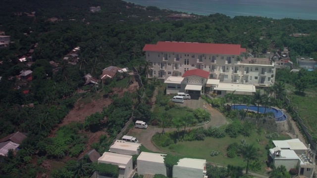 Video Reference: property, aerial photography, suburb, home, photography, residential area, hill station, bird's eye view, estate, real estate