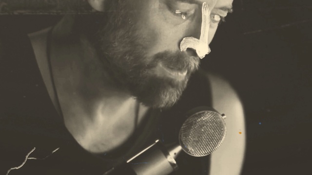 Video Reference: black and white, microphone, facial hair, monochrome, music, monochrome photography, gentleman, audio