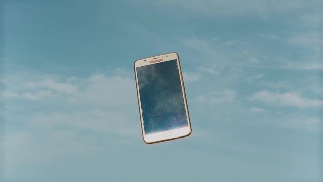 Video Reference: Gadget, Turquoise, Azure, Mobile phone, Technology, Communication device, Electronic device, Sky, Smartphone, Outdoor, Sign, Street, Cellphone, Traffic, View, Phone, City, Bus, Water, Mountain, Close, Light, Green, Sitting, Yellow, Stop, Pole, Blue, Cloudy, White, Mirror, Post, Highway, Ocean, Red, Tower, Plane, Screenshot, Cloud, Clouds