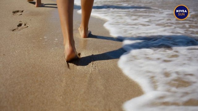 Video Reference: Sand, Leg, Beach, Foot, Barefoot, Shore, Summer, Fun, Human leg, Vacation, Outdoor, Woman, Surfing, Standing, Water, Holding, Playing, Girl, Walking, Board, Ball, Young, Black, White, Riding, Ocean, Street, Frisbee, Red, Feet