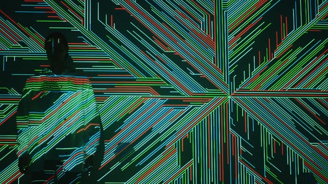 Video Reference: Green, Pattern, Line, Design, Visual arts, Psychedelic art, Graphic design, Pattern, Symmetry, Fractal art, Person