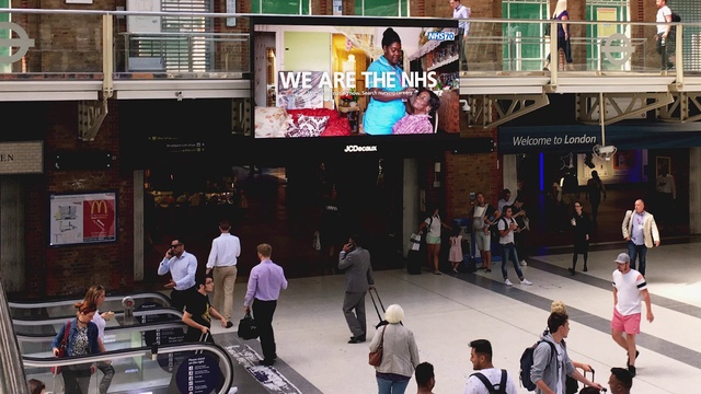 Video Reference: Crowd, Building, Shopping, Event, Pedestrian, Street, Shopping mall, Advertising, City, Leisure