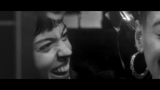 Video Reference: Nose, Eyebrow, Flash photography, Jaw, Gesture, Entertainment, Style, Cool, Movie, Automotive lighting